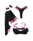 Black and pink latex lingerie set with stockings, and accessories on a white background