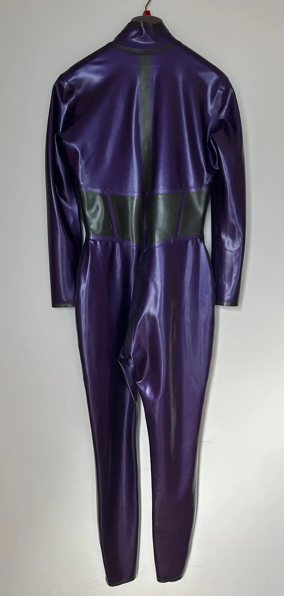 Purple latex catsuit back view