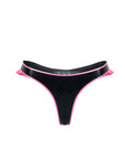 Black latex thong with pink frill trim on a white background
