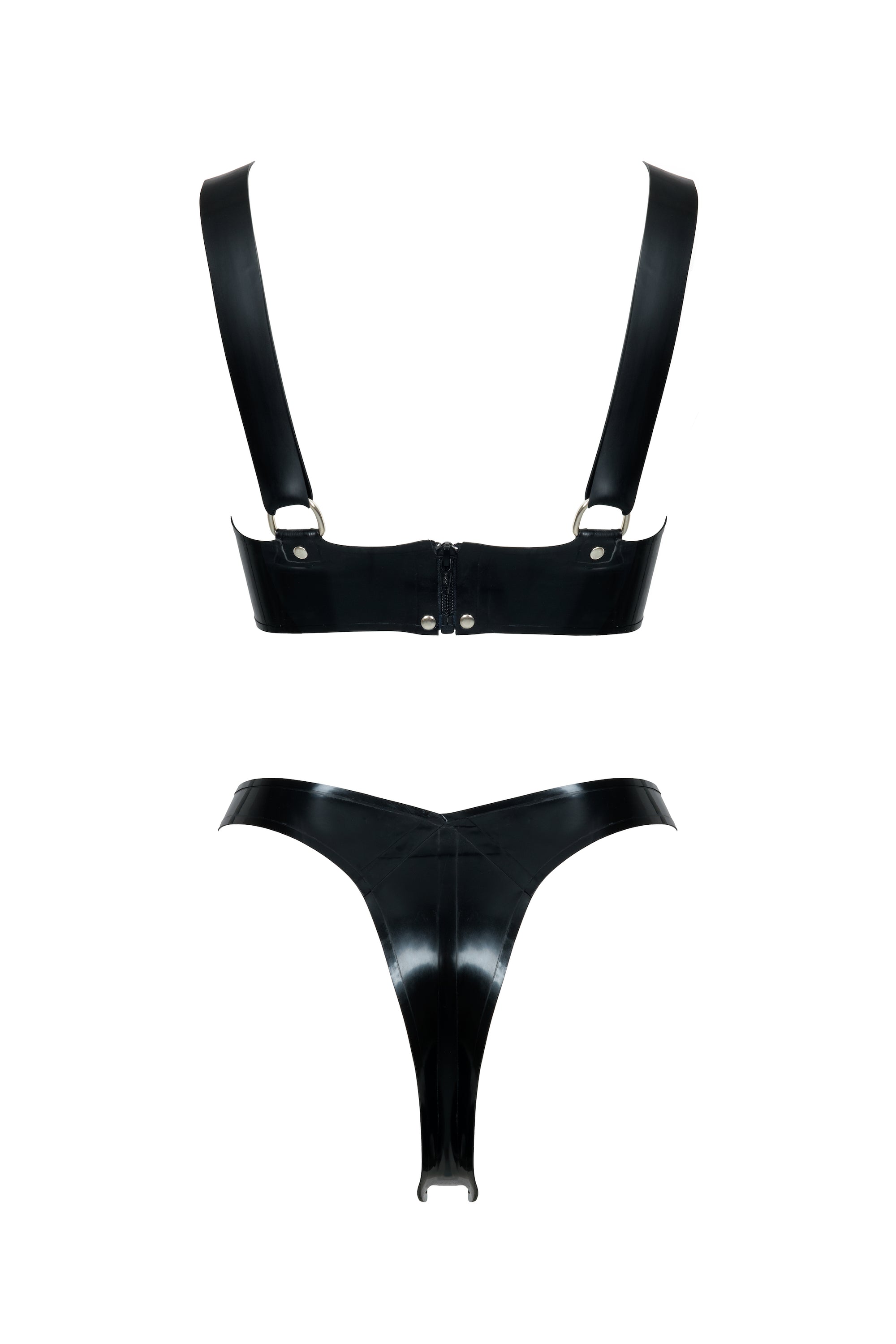 back view of a Leopard print and black latex bra and thong set with black straps on a white background
