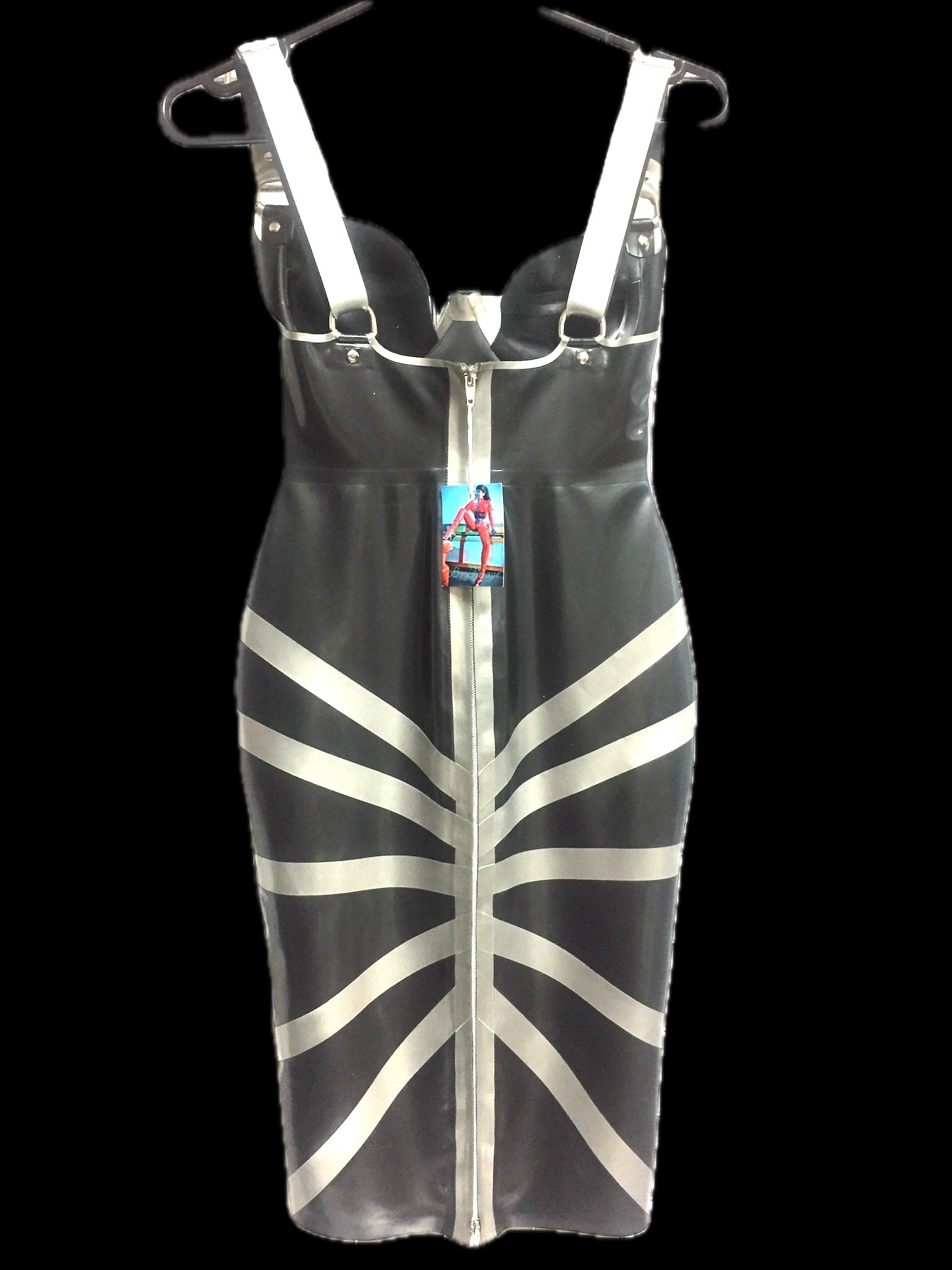 Beautiful fitted sleevless dress with special back pattern details. black version with silver trim.